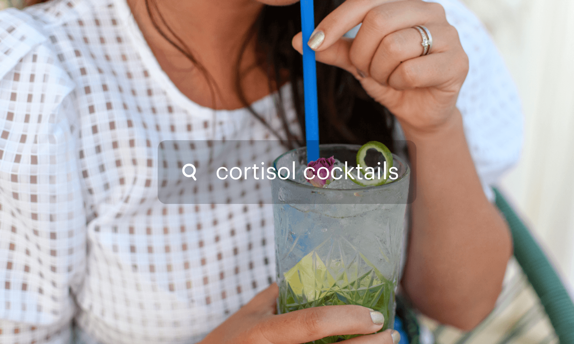 A woman drinking a cocktail with a straw. Search bar text reads: Cortisol cocktails