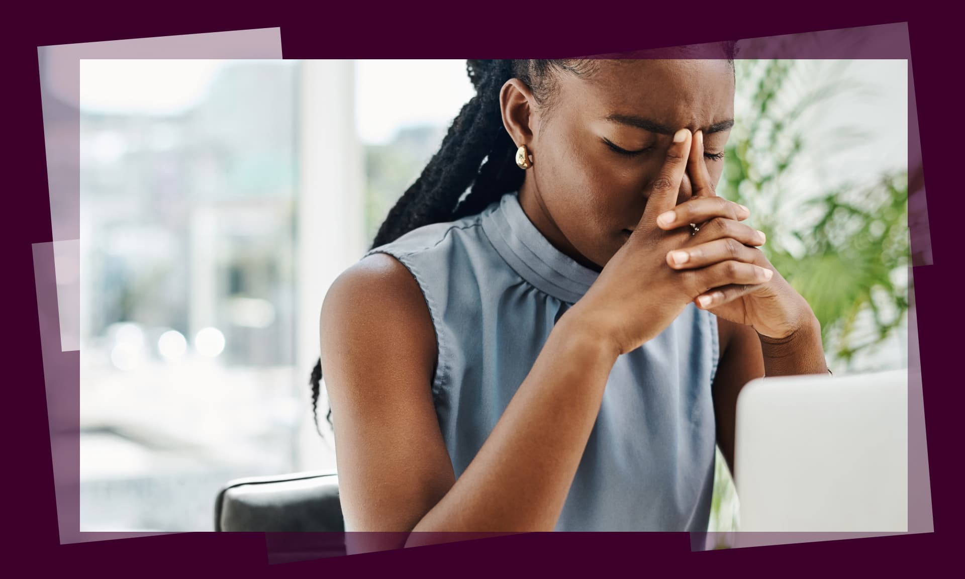 woman stressed sitting at desk